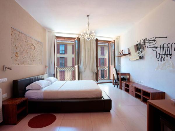 Le Suite Sul Corso : photo 9 de la chambre chambre lit queen-size avec baignoire spa