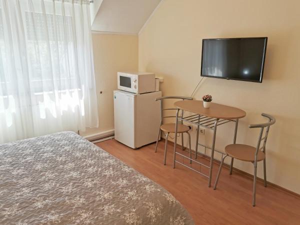 Magic Holiday Vendégház : photo 3 de la chambre chambre double Économique avec salle de bains commune