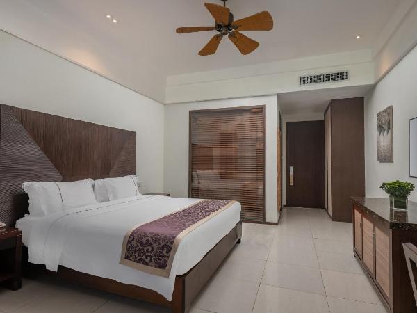 Yalong Bay Mangrove Tree Resort : photo 3 de la chambre chambre lit king-size deluxe - vue sur jardin