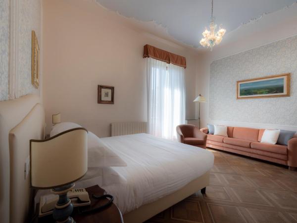Villa Scacciapensieri Boutique Hotel : photo 9 de la chambre chambre double deluxe avec lit d'appoint