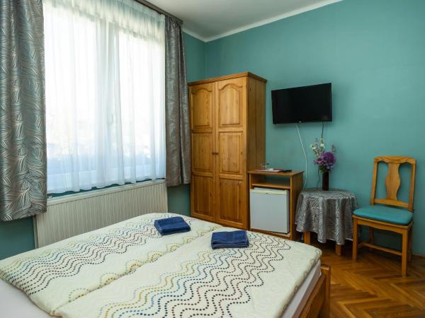 Cecey Vendégház : photo 4 de la chambre chambre double