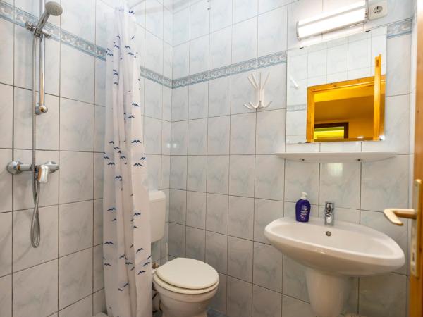 Cecey Vendégház : photo 3 de la chambre chambre triple