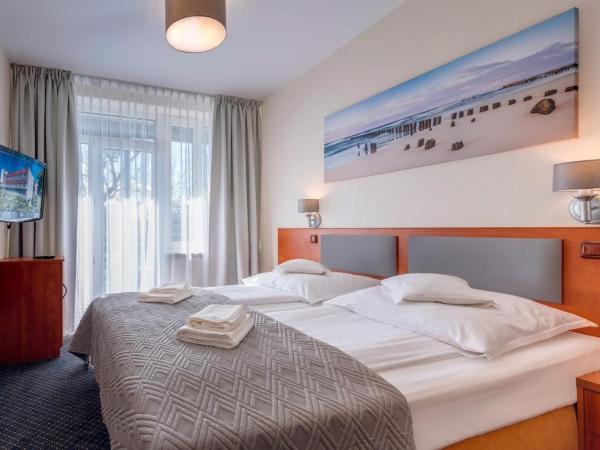 Ośrodek Perełka : photo 6 de la chambre chambre deluxe