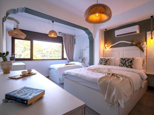 Liman Hotel Gümüslük - Adult Only : photo 4 de la chambre chambre triple classique