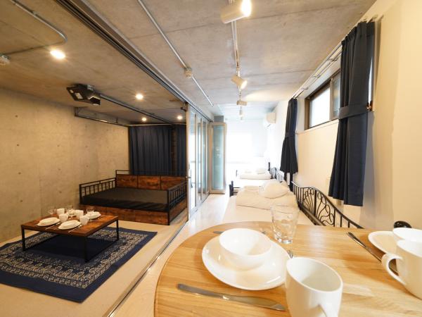 Laffitte Hirai Condominium Hotel : photo 2 de la chambre studio familial