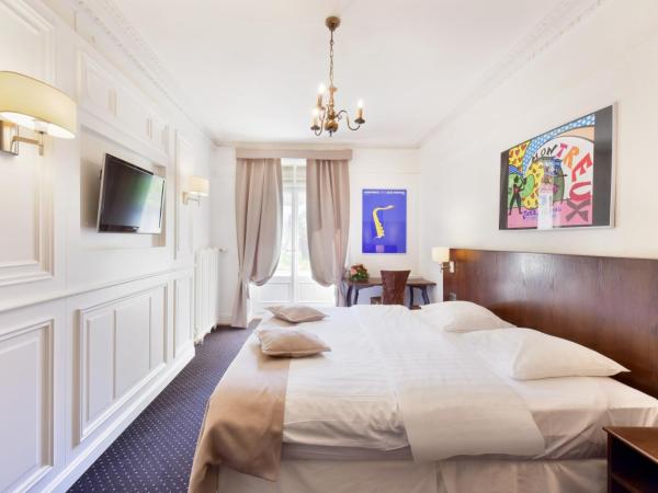 J5 Hotels Helvetie & La Brasserie : photo 3 de la chambre chambre double ou lits jumeaux