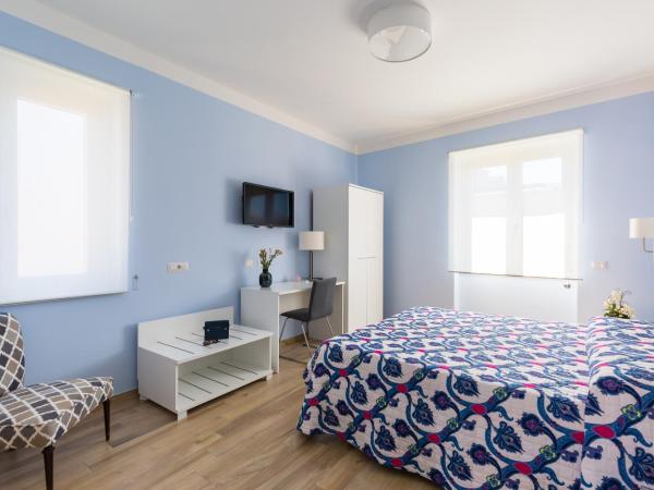 Casa Ela : photo 9 de la chambre chambre double ou lits jumeaux - vue sur jardin