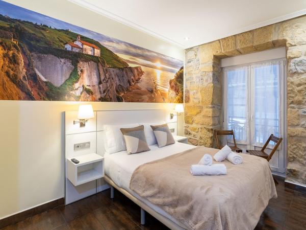 Pension Aida : photo 10 de la chambre studio lit queen-size avec canapé-lit