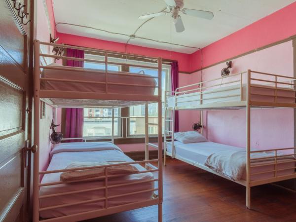 Lucky D's Youth and Traveler's Hostel : photo 3 de la chambre lit dans dortoir pour femmes de 4 lits