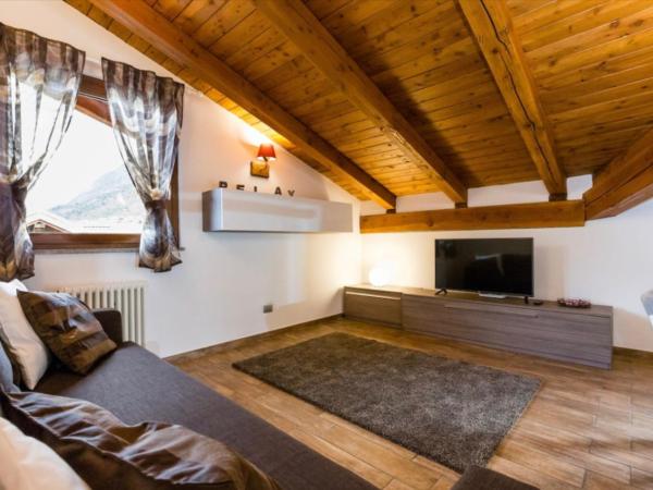 Sottosopra Alps Apartments & Rooms : photo 4 de la chambre appartement avec vue sur la montagne