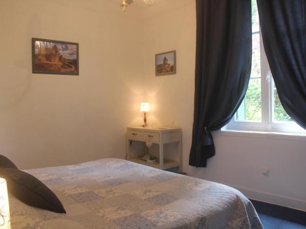 Le Jardin Sarlat : photo 4 de la chambre chambre double ou lits jumeaux deluxe – vue sur jardin