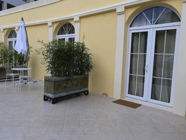 Guesthouse Villa Maggie : photo 10 de la chambre chambre lits jumeaux avec terrasse