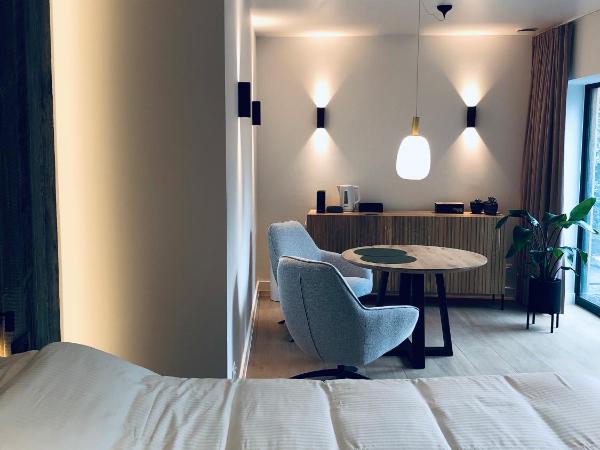 Suites Le Porte-Bonheur : photo 3 de la chambre suite - vue sur jardin