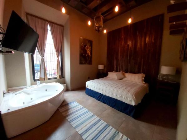 Independencia Dos 7 Hotel Boutique : photo 3 de la chambre suite lit king-size
