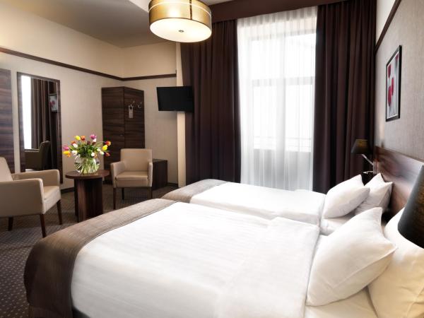 Golden Tulip Krakow City Center : photo 8 de la chambre chambre deluxe double ou lits jumeaux