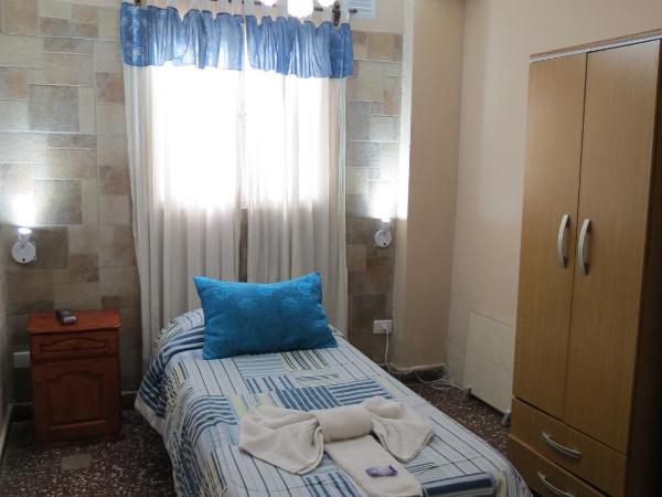 Residencial El Hogar : photo 4 de la chambre petite chambre simple