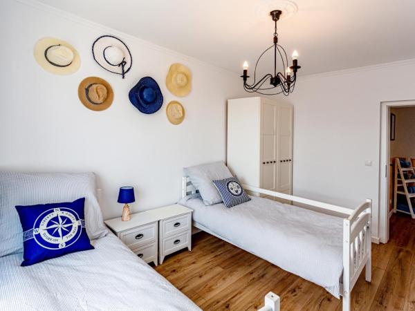 Hostel & Apartments Kołobrzeg : photo 1 de la chambre chambre double avec salle de bains commune