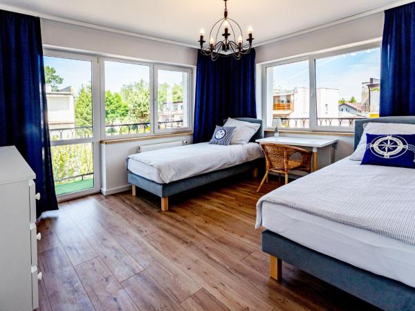 Hostel & Apartments Kołobrzeg : photo 1 de la chambre chambre double avec salle de bains commune