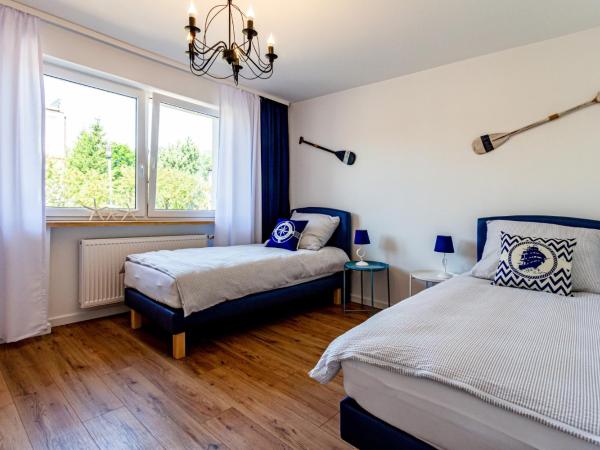 Hostel & Apartments Kołobrzeg : photo 3 de la chambre chambre lits jumeaux avec salle de bains commune