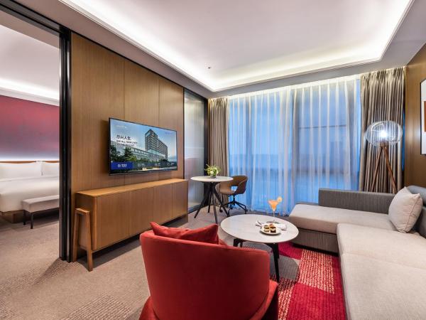 Novotel Dongguan Songshan : photo 1 de la chambre suite deluxe avec lit king-size