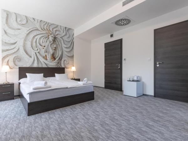 Panzió 81 : photo 1 de la chambre chambre familiale supérieure