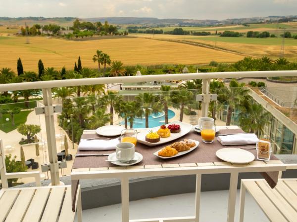 UNAHOTELS MH Matera : photo 2 de la chambre suite exécutive