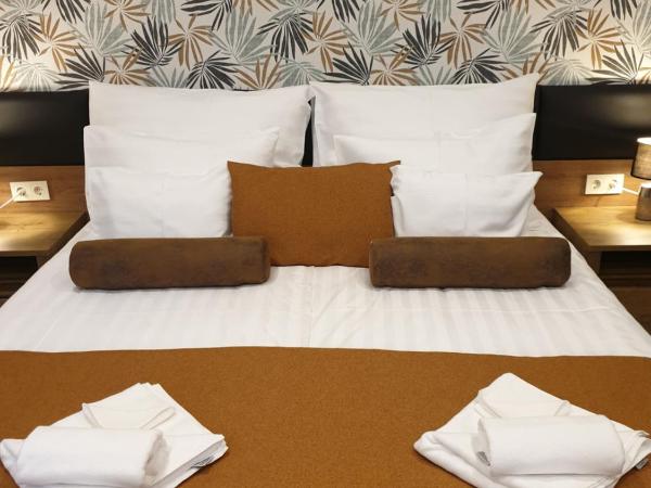 Indium City Panzió : photo 1 de la chambre chambre familiale