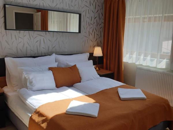 Indium City Panzió : photo 3 de la chambre chambre familiale