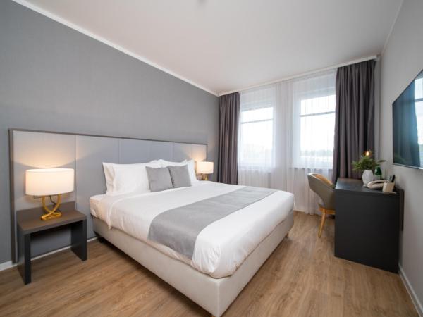 Emily Hotel Leipzig Neue Messe : photo 3 de la chambre chambre double ou lits jumeaux