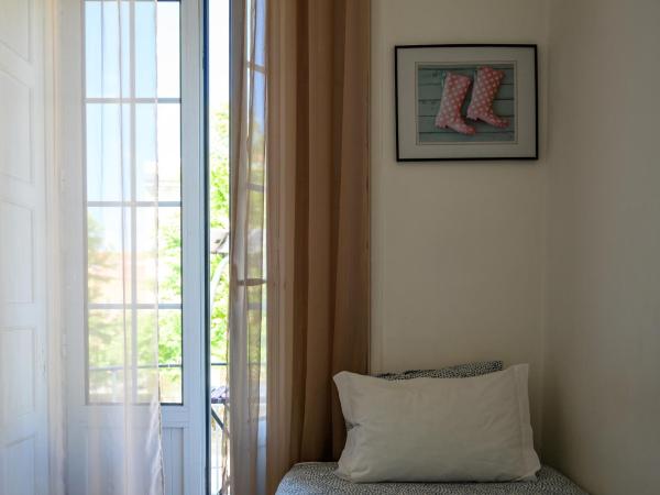 Terrace Lisbon Hostel : photo 1 de la chambre chambre lits jumeaux confort