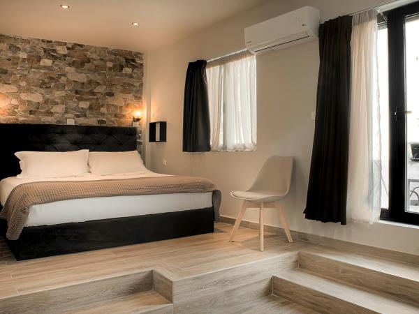 Pallada Athens boutique rooms & apartments : photo 2 de la chambre chambre lit king-size