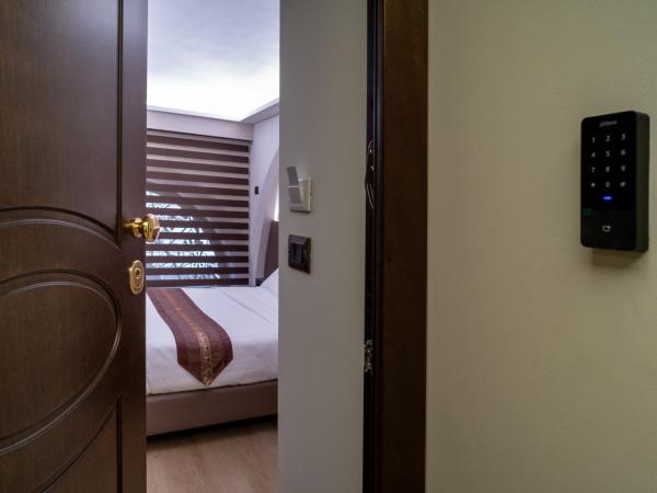 ARCADIAN suite&rooms : photo 3 de la chambre chambre supérieure lit queen-size