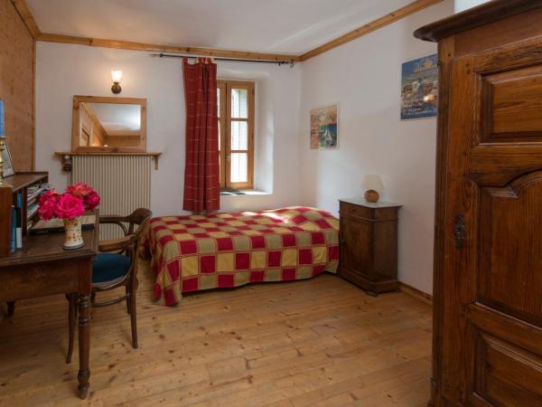 Au Cheval Blanc - appartements et chambres d'hôtes : photo 4 de la chambre suite familiale