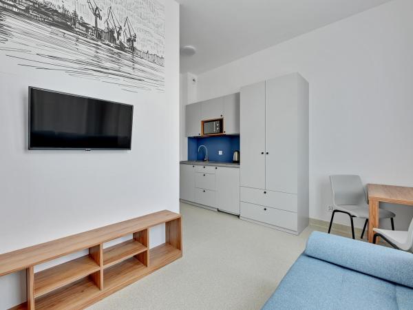 Apartgdynia : photo 4 de la chambre chambre quadruple