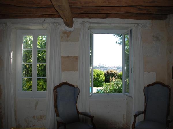 Domaine du Champ Fleuri : photo 5 de la chambre chambre lit queen-size - vue sur piscine