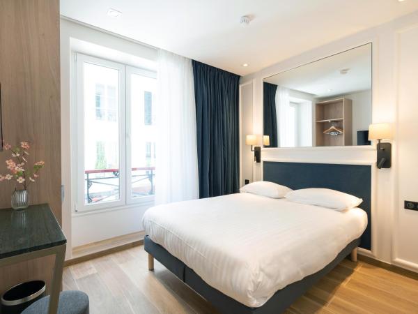 HOTEL AU COEUR DES ARTS ET METIERS : photo 9 de la chambre chambre double - vue sur rue
