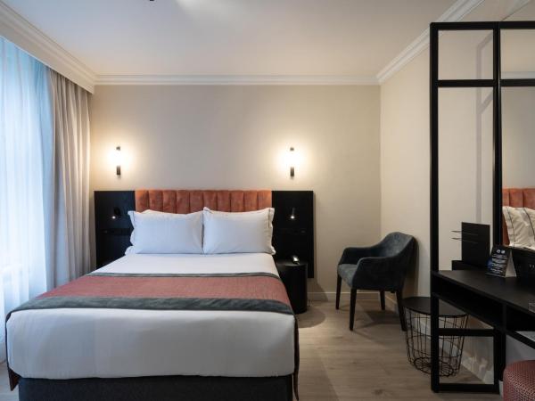 Catalonia Vondel Amsterdam : photo 1 de la chambre petite chambre double premium