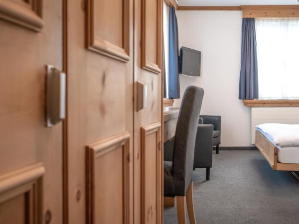 Hotel Alte Post by Mountain Hotels : photo 1 de la chambre chambre simple avec petit lit double.