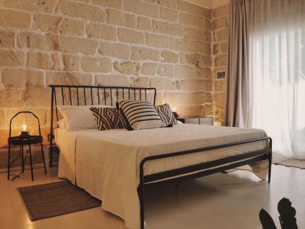 ADELE E IL DUCA Bed and Breakfast : photo 1 de la chambre chambre lit queen-size - vue sur jardin
