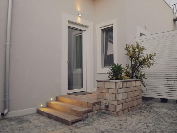 ADELE E IL DUCA Bed and Breakfast : photo 9 de la chambre chambre double avec patio