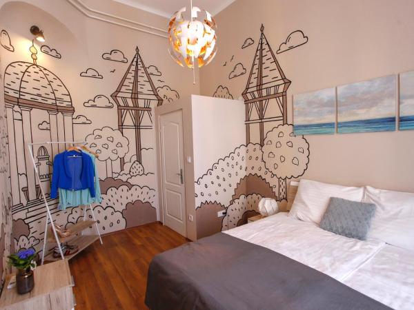 Uránia Apartmanház : photo 9 de la chambre appartement avec salle de bains commune