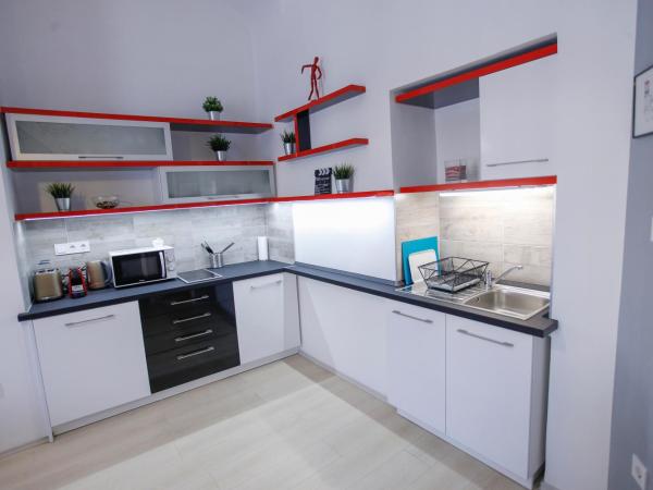 Uránia Apartmanház : photo 1 de la chambre appartement en duplex