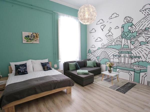 Uránia Apartmanház : photo 8 de la chambre appartement supérieur