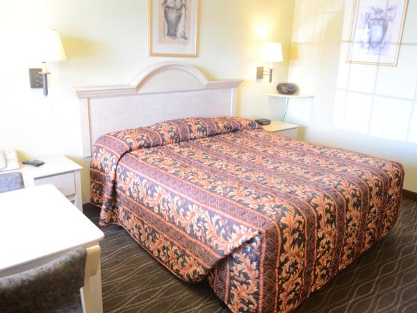 Scottish Inn and Suites NRG Park/Texas Medical Center - Houston : photo 1 de la chambre chambre lit king-size