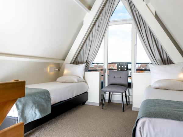 Martin's Brugge : photo 3 de la chambre chambre lits jumeaux confort avec baignoire