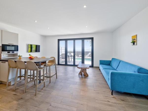 Résidence Pierre & Vacances Premium Les Terrasses d'Arsella : photo 3 de la chambre maison 3 chambres en duplex avec climatisation, piscine privée de 4 mètres et terrasse (6 adultes)