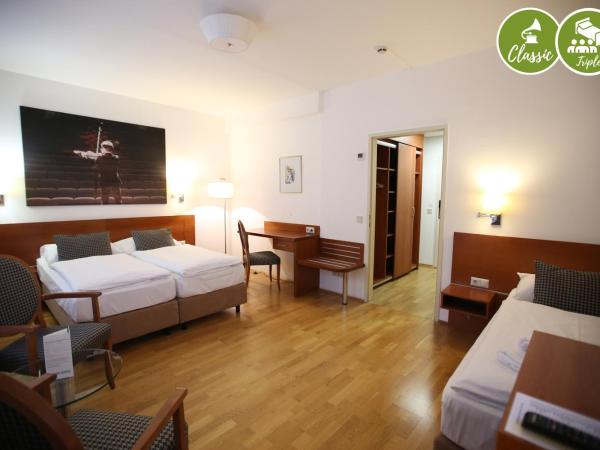 arte Hotel Wien Stadthalle : photo 1 de la chambre chambre triple standard classique