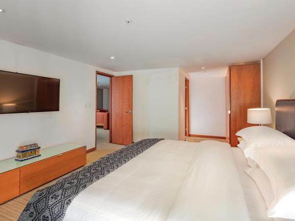 Presidente Intercontinental Puebla, an IHG Hotel : photo 1 de la chambre suite lit king-size affaires