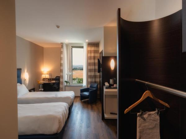 UNAHOTELS MH Matera : photo 2 de la chambre chambre lits jumeaux confort