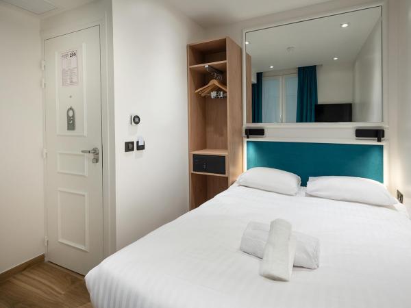 HOTEL AU COEUR DES ARTS ET METIERS : photo 4 de la chambre chambre double – vue sur cour